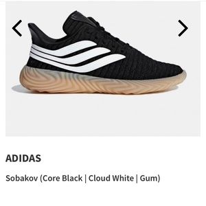 Black and white Adidas Sobakov tennis shoes